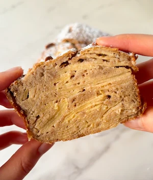Healthy invisible apple cake sliced showing layered apple texture