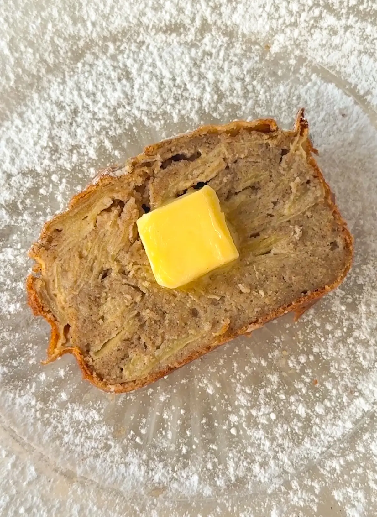 Sliced healthy invisible apple cake showing beautiful layered apple slices